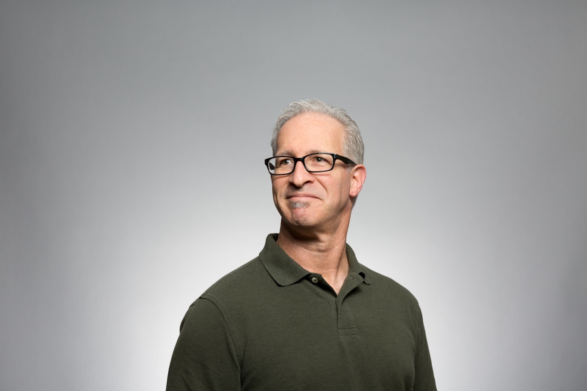 Senior CyberMind security analyst at threat monitoring workstation in Toronto studio